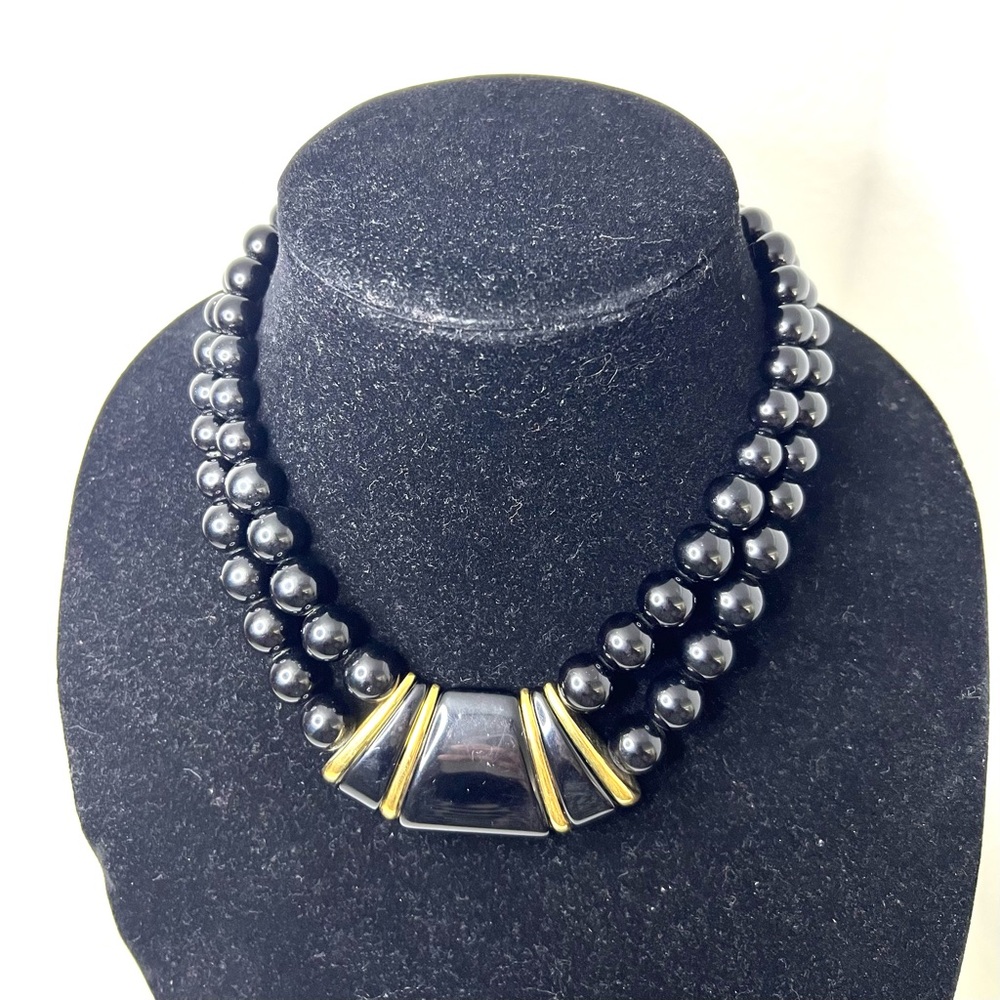 Napier two-strand black beaded collar necklace gold tone.